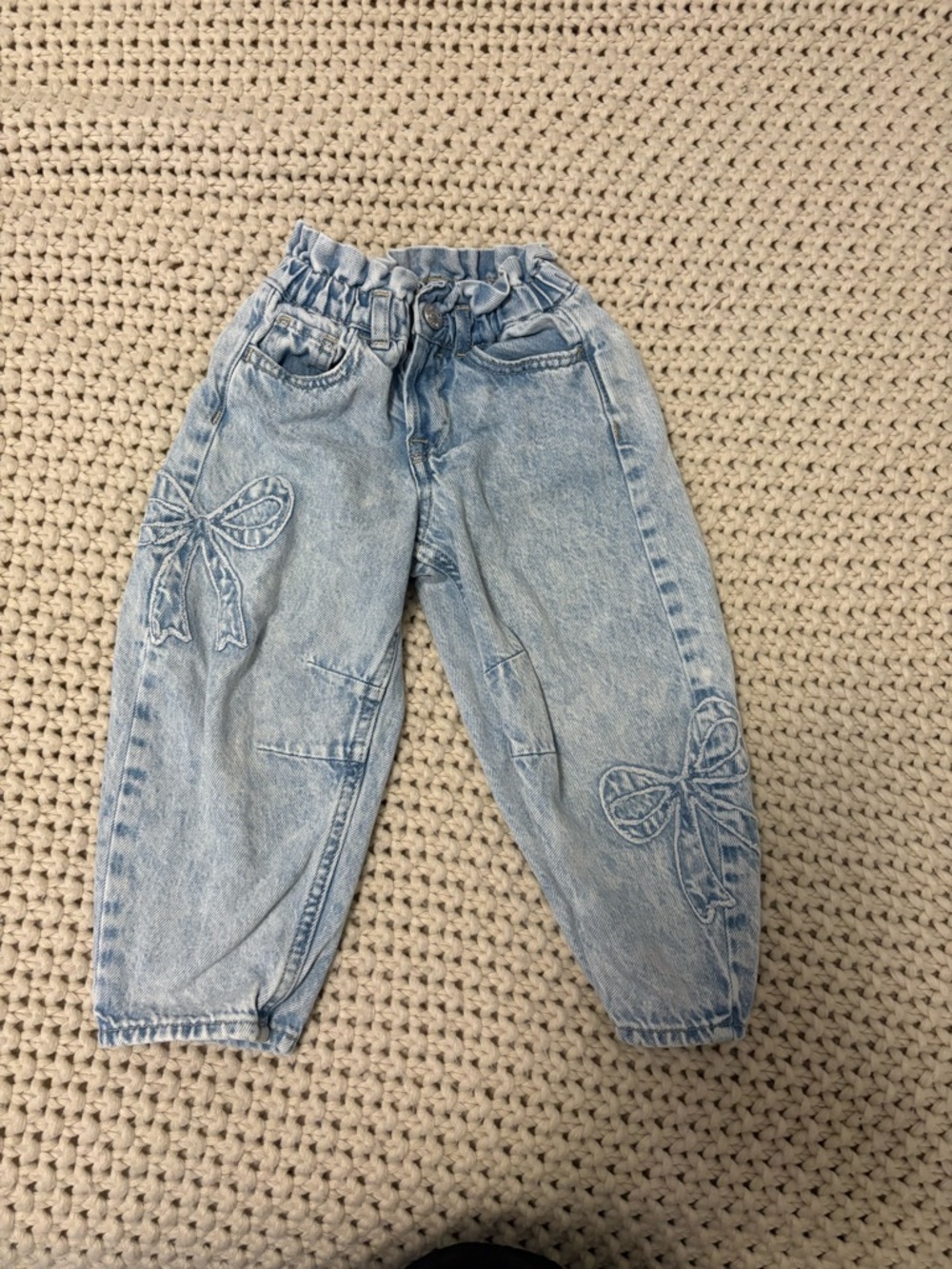 Toddler 3 horseshoe jeans with bow detail. From gap.